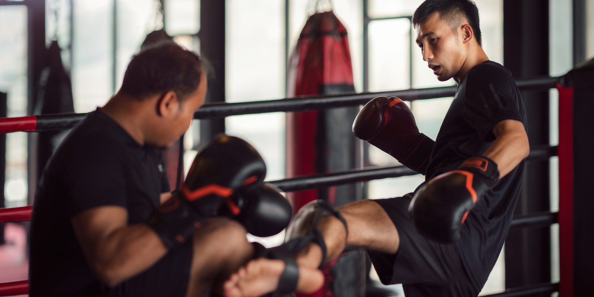 Muay Thai kickboxing trainer and kickboxer